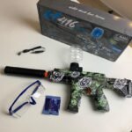 Pistolet muni de billes pour l'eau